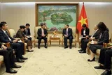 Phó Thủ tướng Thường trực Chính phủ Phạm Gia Túc tiếp Bí thư Thành ủy, Chủ tịch HĐND Thủ đô Vientiane (Lào)