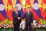 Việt Nam luôn kề vai sát cánh hỗ trợ Lào hiện thực hoá các mục tiêu chiến lược đã đề ra