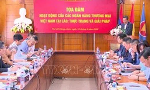 Tháo gỡ rào cản, thúc đẩy liên kết tài chính Việt - Lào