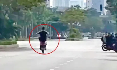 Con trai bốc đầu xe máy trên phố, bố bị phạt 9 triệu đồng