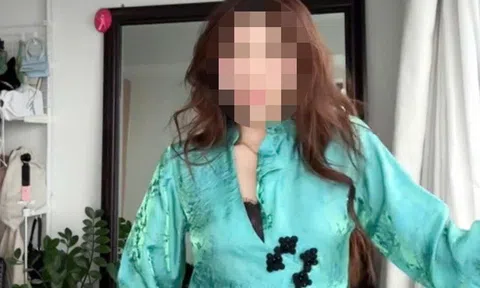 Mẫu áo dài xẻ ngực gây tranh cãi, nhãn hàng ở TPHCM thu hồi sản phẩm