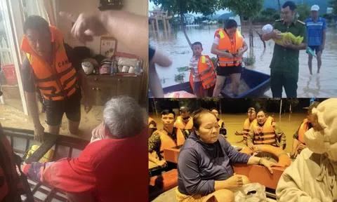 Liều mình giữa dòng nước xiết, người chỉ huy giữ an toàn cho dân