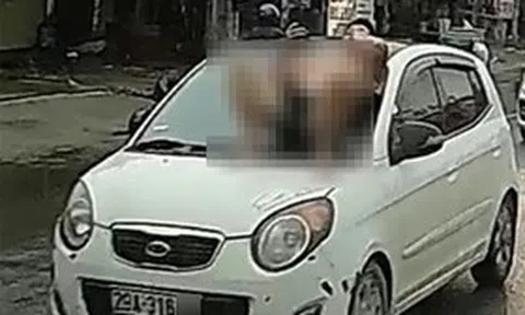 Khởi tố bố vợ và con rể trong vụ nằm trên nắp capo ô tô đang chạy ở Hà Nội