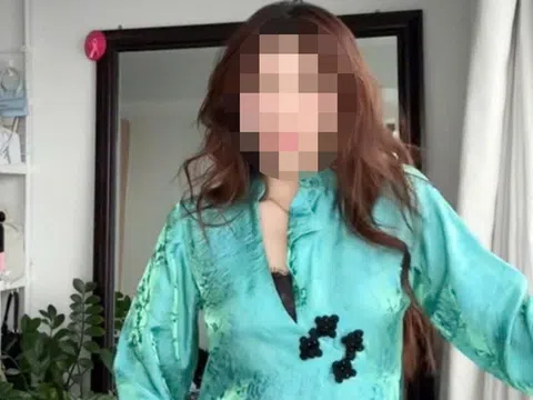 Mẫu áo dài xẻ ngực gây tranh cãi, nhãn hàng ở TPHCM thu hồi sản phẩm